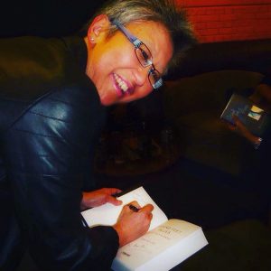 Writer and creative actionista Yang-May Ooi signing her memoir Bound Feet Blues