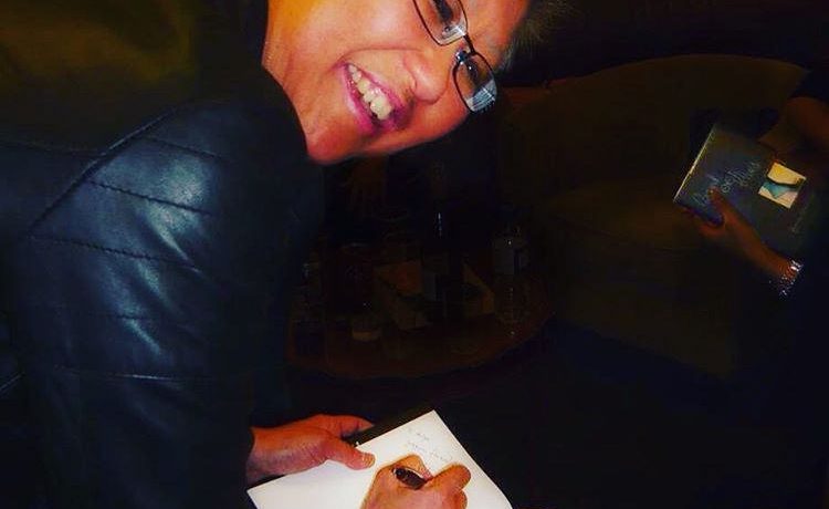 Writer and creative actionista Yang-May Ooi signing her memoir Bound Feet Blues