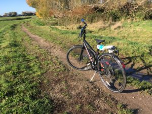 Bicycle in a field - to illustrate Surprised by Sandford Lock by Yang-May Ooi in her blog Oxford Moments