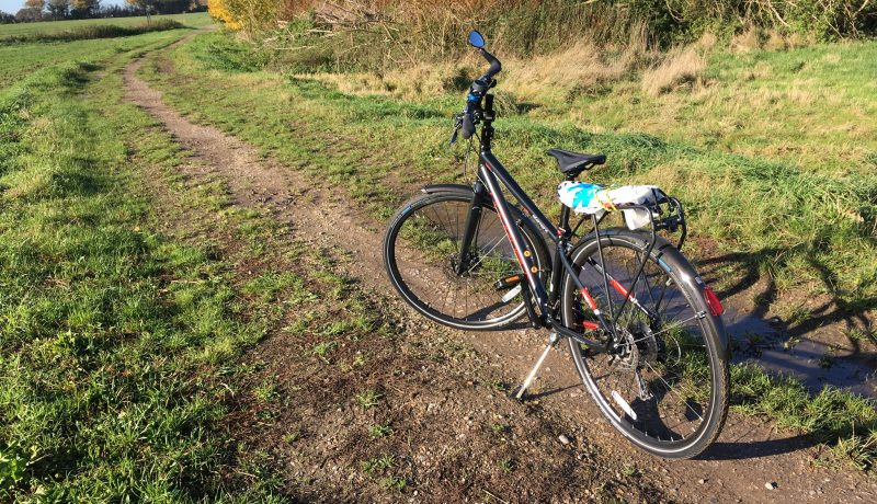 Bicycle in a field - to illustrate Surprised by Sandford Lock by Yang-May Ooi in her blog Oxford Moments