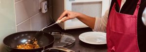 Wok frying to illustrate Curry Pasties, The Taste of Two Homes by writer Yang-May Ooi ¦ Oxford Moments blog