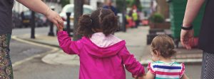 Kids walking to illustrate a blog post about going back to school after lockdown by author Yang-May Ooi